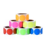 Moving labels stacked in rolls in a selection of bright colours