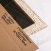 Small mirror inserted in moving box with bubble wrap