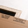 Small mirror inserted in moving box with bubble wrap