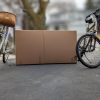 Two bicycles posed in front of C1033 bicycle box