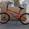 Sporty bicycle posed in front of C1033 bicycle box